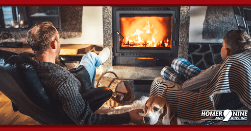 couple in front of a fire